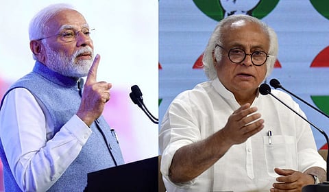 Army and Assam Rifles personnel conduct a flag march in violence-hit areas across Manipur. 