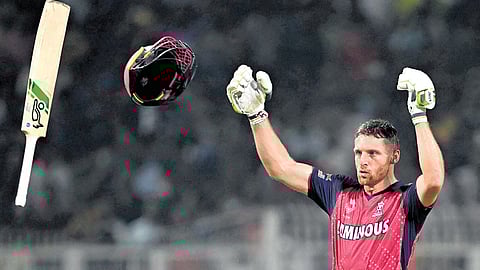 Rajasthan’s Jos Buttler celebrates after taking his team home against Kolkata