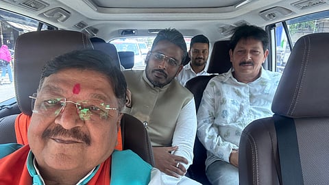 Senior BJP leader and state cabinet minister Kailash Vijayvargiya with Akshay Kanti Bam. Local BJP MLA Ramesh Mendola was also seen in the photo.