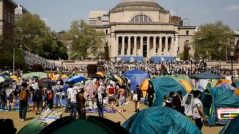 Student protesters gather in protest inside their encampment on the Columbia University campus, Monday, April 29, 2024, in New York.