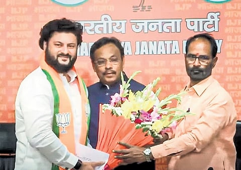 Kendrapara MP Anubhav Mohanty (left) joining the BJP in Delhi on Monday 