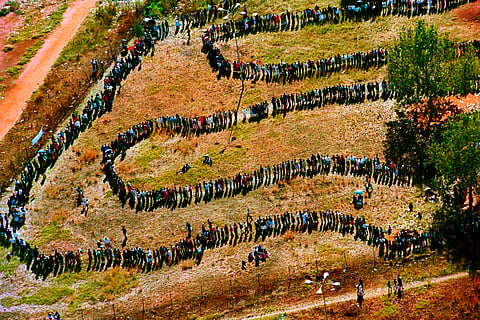 People queue to cast their votes In Soweto, South Africa April 27, 1994, in the country's first all-race elections.