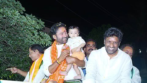 BJP State president G Kishan Reddy takes part in the election campaign at Jubliee Hills on Sunday.