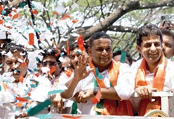 Bengaluru Central Congress candidate Mansoor Ali Khan, with Shivajinagar MLA Rizwan Arshad, arrives at the BBMP head office to file his nomination on Wednesday