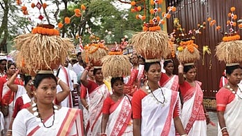 Braving sultry weather conditions, the tribal women wearing white sarees carried pots filled with grains and marched in an impressive procession from two directions to the Sarna Puja Sthal (sanctum sanctorium) venue in front of Rourkela Municipal College.