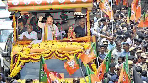 Home Minister Amit Shah during the road-show at Thuckalay in Kanniyakumari Lok Sabha constituency on Saturday