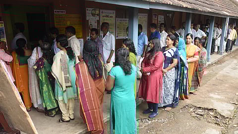 People waiting to caste vote at Chakkai Government HSS in Thiruvananthapuram.