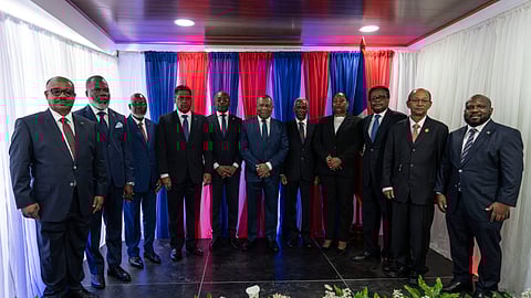 Members of Haiti's transitional council pose for a group photo during an installation ceremony, in Port-au-Prince, Haiti, Thursday, April 25, 2024.