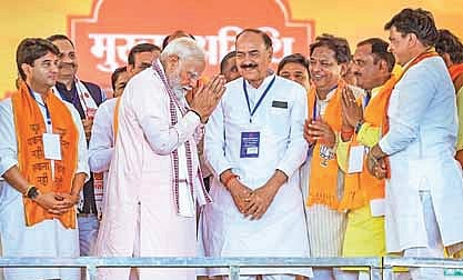 Prime Minister Narendra Modi at a public meeting in Morena of Madhya Pradesh on Thursday. Union Minister and BJP leader Jyotiraditya Scindia can also be seen .