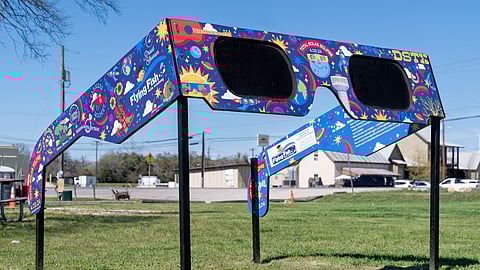 The City of Dripping Springs, Texas, prepares for the solar eclipse with a set of larger than life glasses on display at Veterans Memorial Park on March 5, 2024.