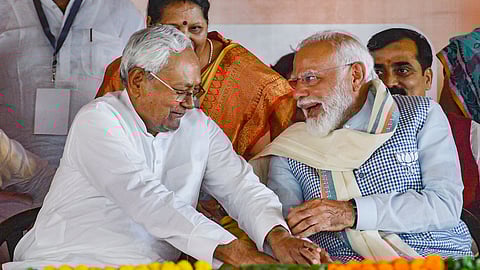 Prime Minister Narendra Modi with Bihar Chief Minister Nitish Kumar during a public meeting ahead of the Lok Sabha elections, in Nawada.