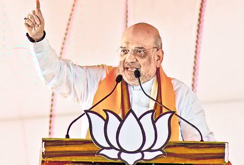 Home Minister Amit Shah addresses a rally in Moradabad, Uttar Pradesh on Friday.