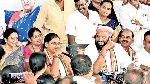 Civil Supplies Minister N Uttam Kumar Reddy reacts to a comment by Congress MLA N Padmavathi during a meeting with party workers in Miryalaguda on Tuesday. 