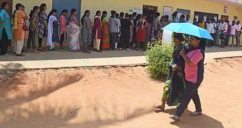 People waiting to cast their vote in the election.