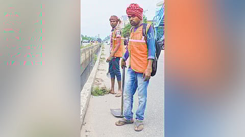 Contract workers Uday Mandal and Suho Mandal, natives of West Bengal working in Kerala. 
