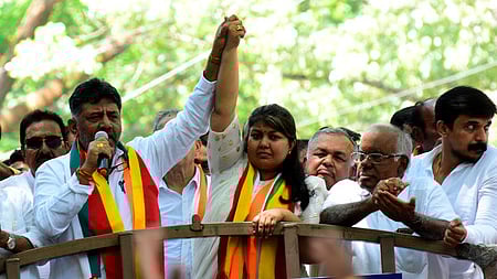 Congress candidate for Bengaluru South Sowmya Reddy  arrives in a rally with DCM D K Shivakumar