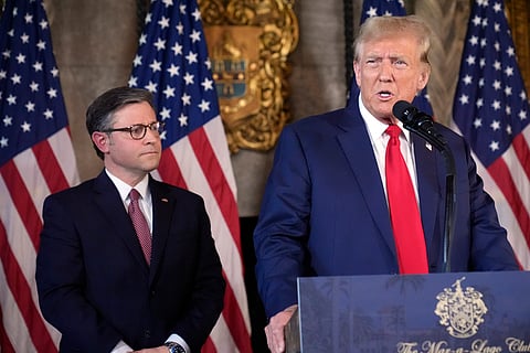 Republican presidential candidate former President Donald Trump speaks as Speaker of the House Mike Johnson, R-La., listens during a news conference, Friday, April 12, 2024, at Mar-a-Lago in Palm Beach, Florida.