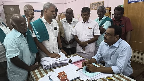 Around 100 farmers returned their Voters ID to Tashildar (Kangeyam) seeking appropriate release of water in PAP canal in Tiruppur district.