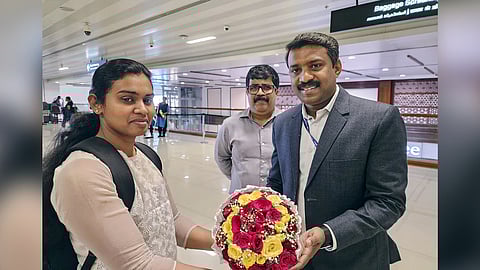 Ann Tessa Joseph, a deck cadet who was a part of 17 Indian Indian nationals onboard the seized vessel MSC Aries, on her arrival at the Cochin Airport. 