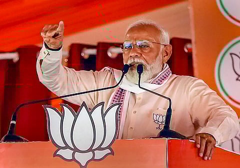Prime Minister Narendra Modi felicitates a child during the inauguration ceremony of the RJ Sankara Eye Hospital, in Varanasi, Sunday.