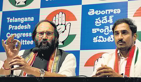 Civil Supplies Minister N Uttam Kumar Reddy addresses the media at the Gandhi Bhavan in Hyderabad on Monday. TPCC spokesperson Sama Ram Mohan Reddy is also seen