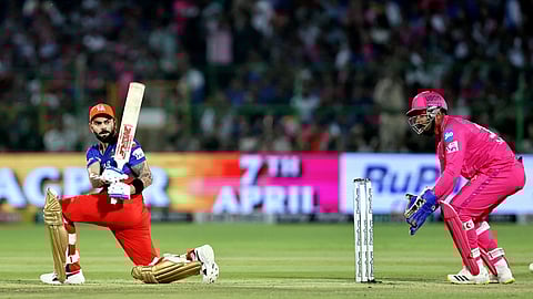 Royal Challengers Bengaluru's Virat Kohli plays a shot during the Indian Premier League (IPL) 2024 T20 cricket match between Rajasthan Royals and Royal Challengers Bengaluru at Sawai Mansingh Stadium, in Jaipur. 