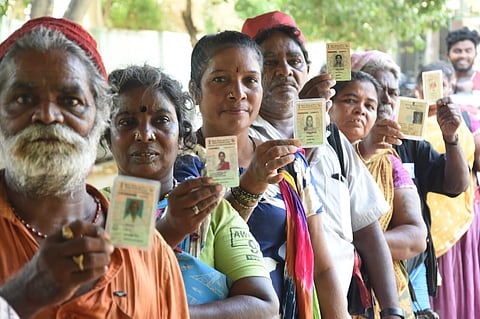 Narikuravar community members waiting in queue to cast their votes in Pallavaram, Chennai.