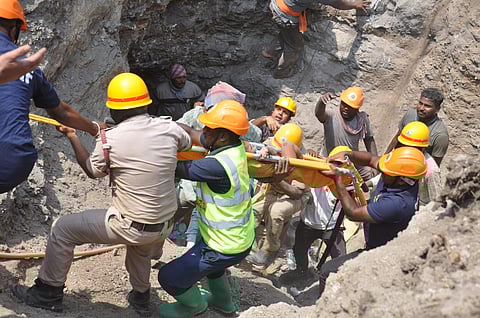 Satwik Mujagond being rescued from the tubewell in Lachyan village of Indi taluk of Vijayapura district on Thursday (Photo | Special arrangement)