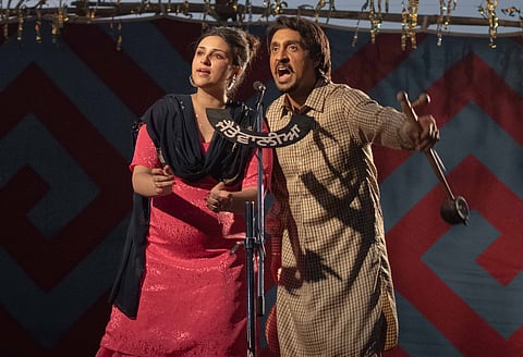 A still from Imtiaz Ali's latest film, 'Amar Singh Chamkila' starring Diljit Dosanjh and Parineeti Chopra 
