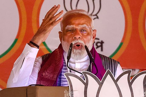 Prime Minister Narendra Modi addresses a public meeting for Lok Sabha elections, in Malda district, Friday, April 26, 2024.