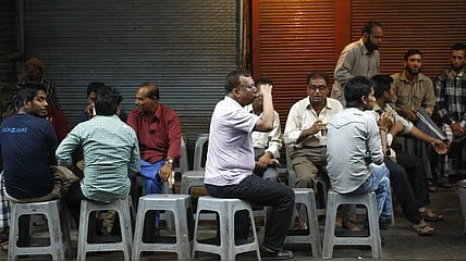 As the aroma of freshly brewed tea mingles with the scent of ink and newsprint, discussions ensue.