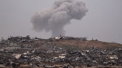 Smoke rises to the sky after an explosion in the Gaza Strip as seen from southern Israel. 