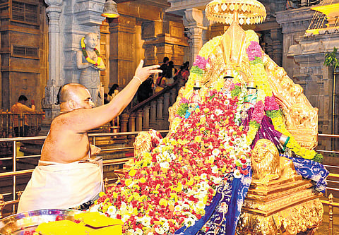 A priest performing pooja at Yadagirigutta on Sunday 