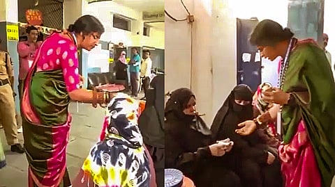 BJP candidate Madhavi Latha checks identities of Muslim women at a polling station during the fourth phase of Lok Sabha elections.