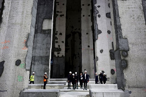 Paris' mayor Anne Hidalgo and other officials attend the inauguration of the Austerlitz wastewater and rainwater storage basin, which is intended to make the Seine river swimmable during the Paris 2024 Olympic Games, in Paris, Thursday, May 2, 2024. 