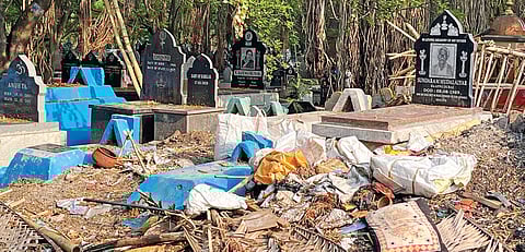 Garlands thrown at Kalpalli burial ground as workers claim they have not been provided with dustbins to discard the waste 