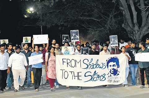 A section of University of Hyderabad (UoH) students protest inside their campus against the Telangana police’s closure report in the Rohith Vemula case on Friday