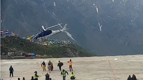 The helicopter landed a few metres from the helipad at the Himalayan temple.
