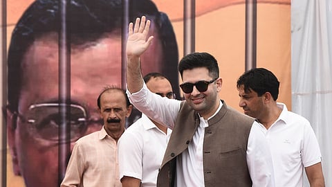 AAP MP Raghav Chadha at a party meeting at the party office ahead of a protest march, in New Delhi.