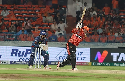 Sunrisers Hyderabad's Travis Head and Abhishek Sharma celebrate after winning the IPL 2024 T20 cricket match between Sunrisers Hyderabad and Lucknow Super Giants on May 8, 2024.