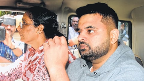 SIT officers accompanying Hassan MP Prajwal Revanna to Bowring Hospital for a medical examination in Bengaluru
