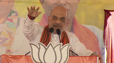 Union Home Minister Amit Shah addresses a poll rally in Serampore, West Bengal, on Wednesday.
