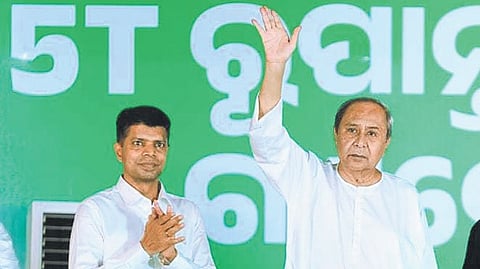 BJD leader and 5T chairman VK Pandian (L) with Odisha CM Naveen Patnaik during a poll rally.