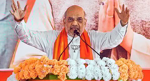 Union Home Minister Amit Shah addresses during a public meeting for Lok Sabha elections, in North 24 Parganas, Tuesday, May 14, 2024. 