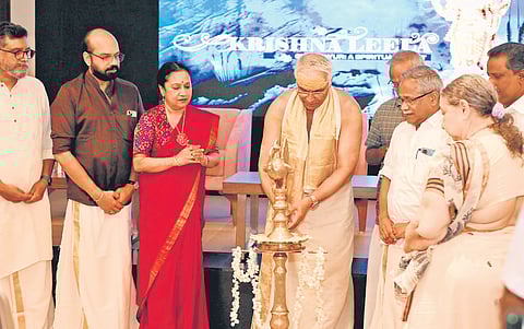 Guruvayur temple thantri Chennas Dineshan Namboothiripad lighting the lamp at Krishnaleela Sayahnam organised by The New Indian Express.