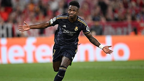 Real Madrid's Brazilian forward Vinicius Junior celebrates scoring during the UEFA Champions League semi-final first leg football match between FC Bayern Munich and Real Madrid CF on April 30, 2024.