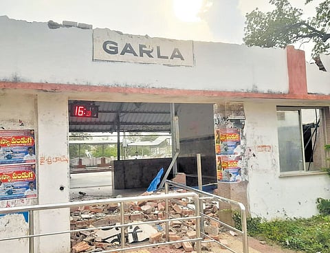 The collapsed entrance wall and roof of the Garla railway station in Mahabubabad district on Sunday 