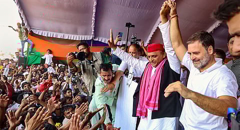 Samajwadi Party President Akhilesh Yadav and Congress leader Rahul Gandhi during public rally for Lok Sabha polls, in Phulpur, Sunday, May 19, 2024. 
