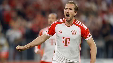 Bayern Munich's Harry Kane celebrates scoring the 2-1 goal from the penalty spot during the UEFA Champions League semi-final first leg football match between FC Bayern Munich and Real Madrid