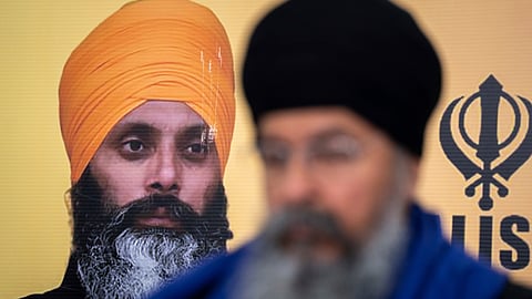 A photo of Hardeep Singh Nijjar is seen during a news conference providing an update from the Sikh community about Nijjar's homicide from June 18, 2023 in Surrey, B.C. on Friday, May 3, 2024.